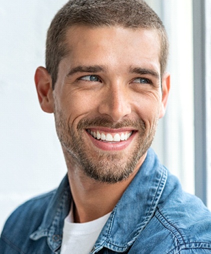 Man smiling with white, healthy teeth
