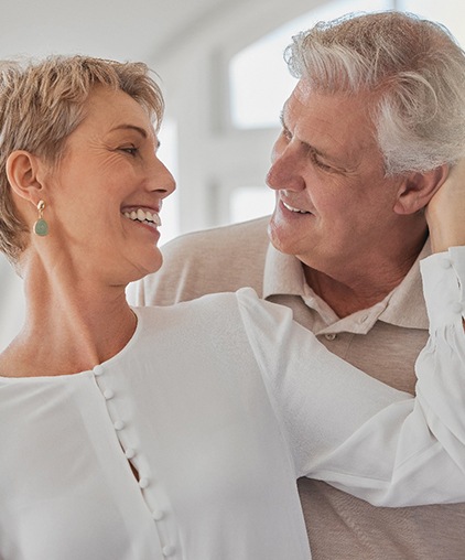 Happy, mature couple enjoying a romantic moment